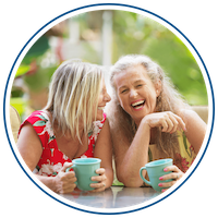 Photo of middle-aged women laughing